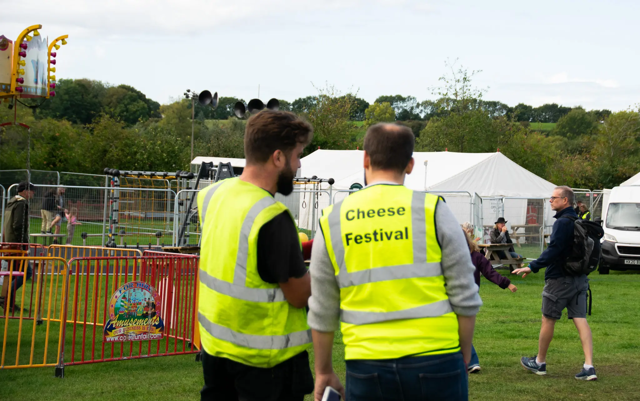 Event staff at outdoor cheese festival