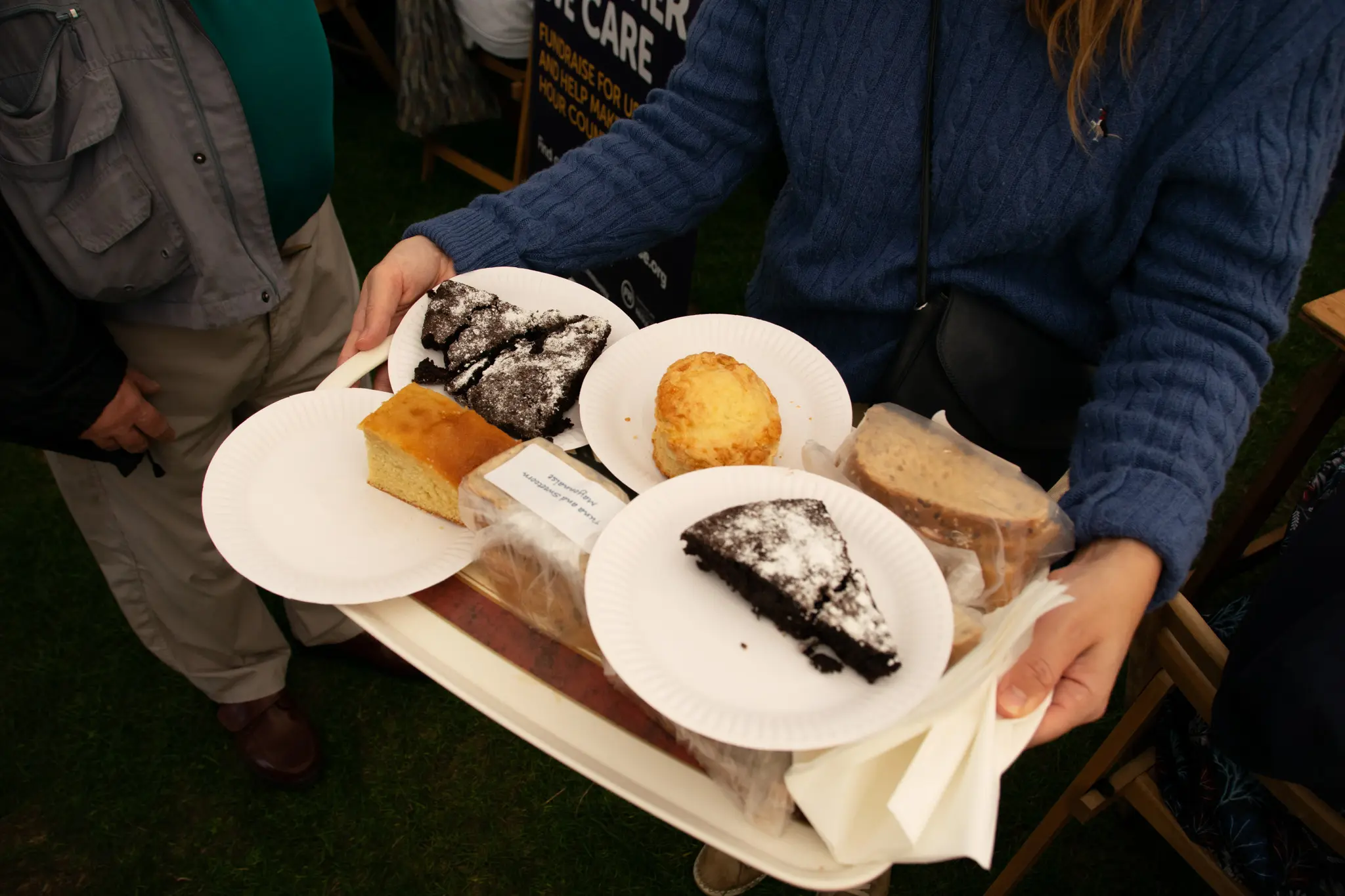 Various pastries on white plates