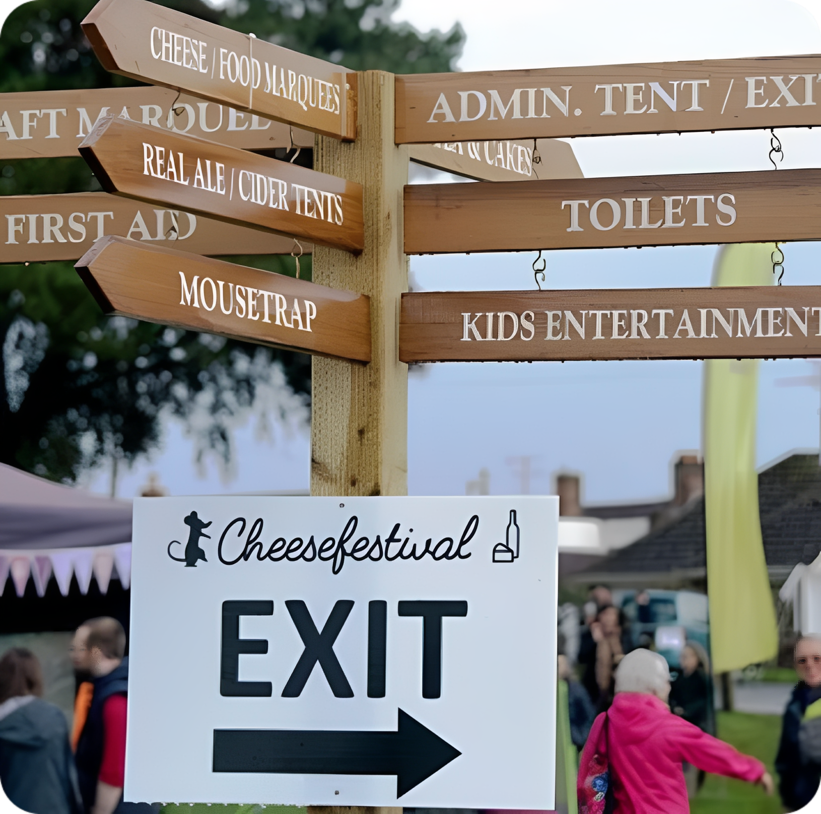 Festival direction signs with exit arrow