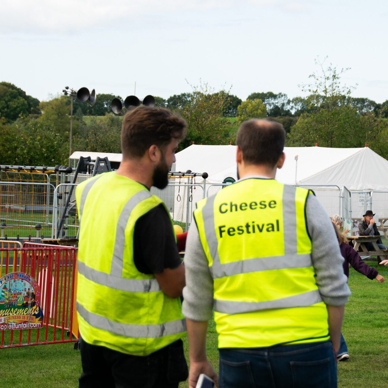 Event staff at outdoor cheese festival